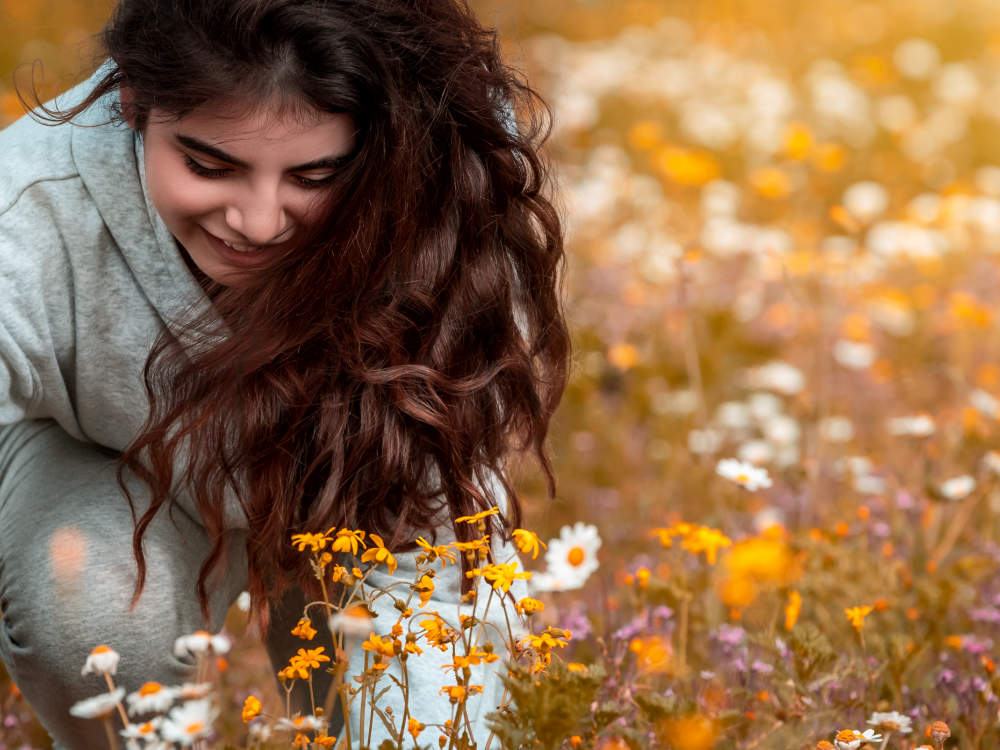 Happy Girl in flower field